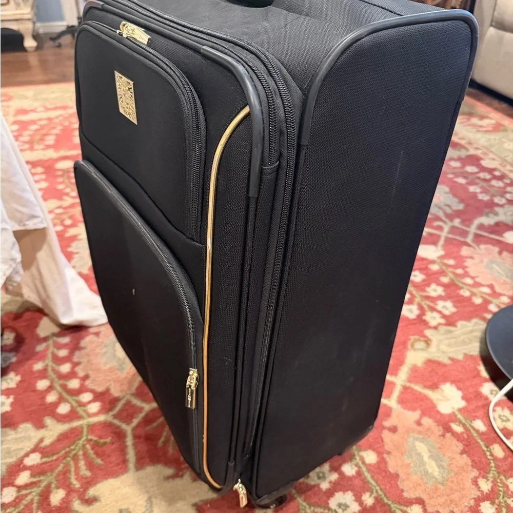 Anne Klein Classic Black and Gold Travel Roller Luggage